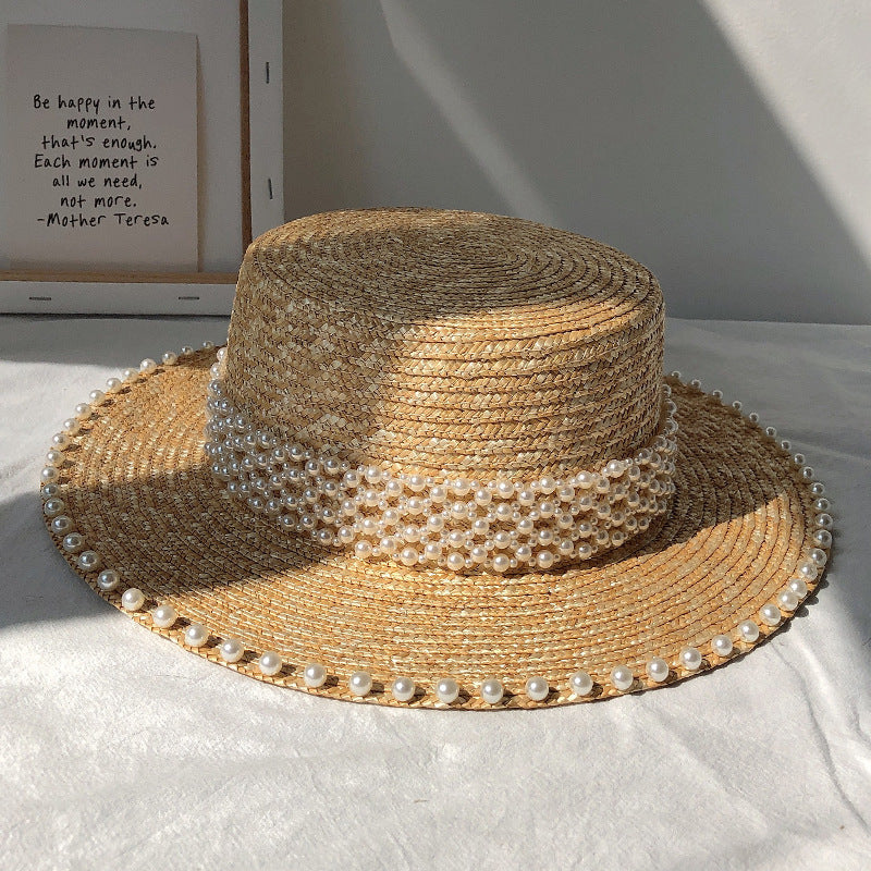 Chapeau de soleil à la mode pour femme, style plat
