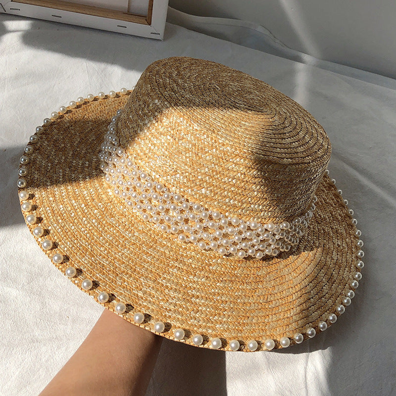 Chapeau de soleil à la mode pour femme, style plat