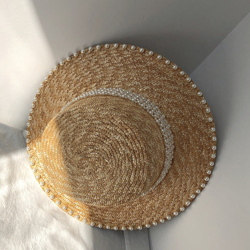 Chapeau de soleil à la mode pour femme, style plat