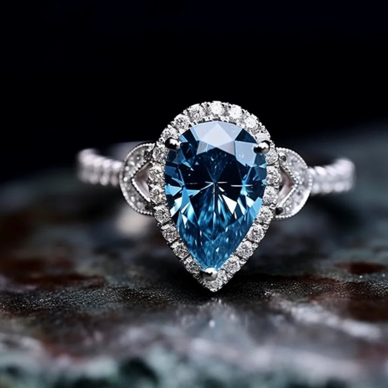 Bague de fiançailles halo de haute qualité SGARIT Fine Jewelry en or blanc 14 carats avec diamant bleu pour femme (SGARIT Fine Jewelry High Quality Engagement Halo Rings 14K White Gold Pear Cut 3CT for Woman)