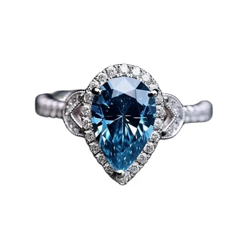 Bague de fiançailles halo de haute qualité SGARIT Fine Jewelry en or blanc 14 carats avec diamant bleu pour femme (SGARIT Fine Jewelry High Quality Engagement Halo Rings 14K White Gold Pear Cut 3CT for Woman)
