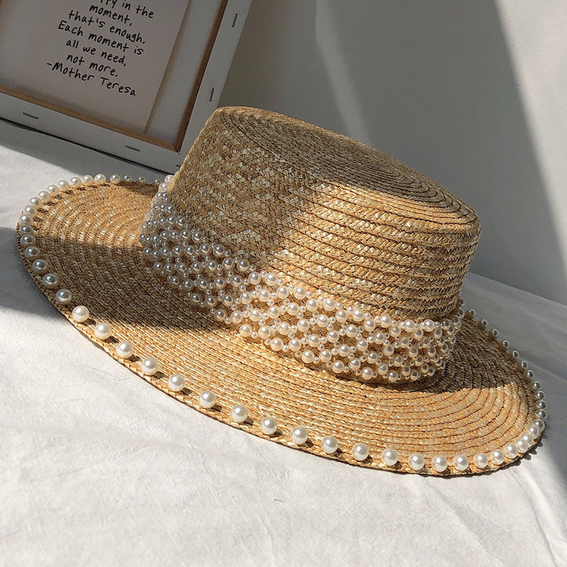 Chapeau de soleil à la mode pour femme, style plat