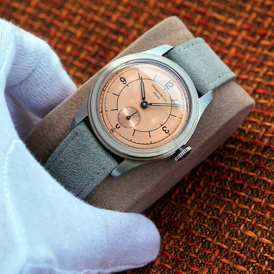 Montre Pierre Paulin à cadran saumon 50 m ,de plongée vintage à petite seconde et mécanique à aiguille 38 mm